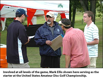 Involved at all levels of the game, Mark Ellis shown here serving as the starter at the United States Amateur Disc Golf Championship